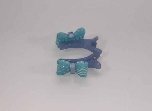 Crocodile clips with bow