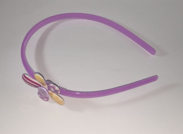 Head band with patterned flower shape