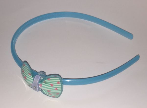 Head band with patterned bow