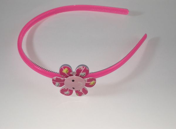 Head band with patterned flower shape
