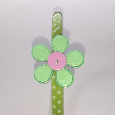Polka dots patterned headband with flower shape