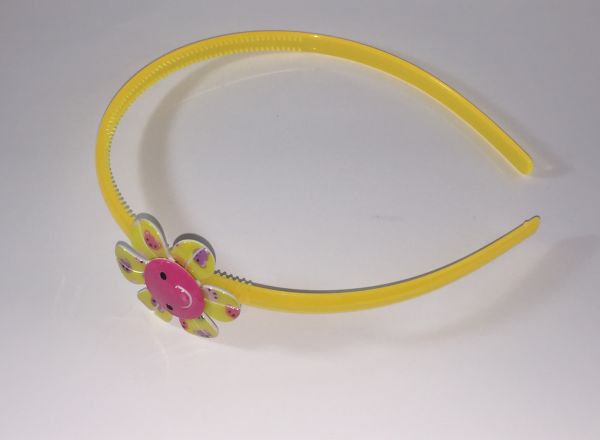 Head band with patterned flower shape