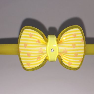 Head band with patterned bow