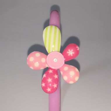Head band with patterned flower shape