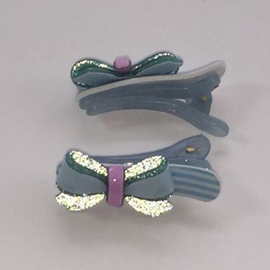 Crocodile clips with glittery bow