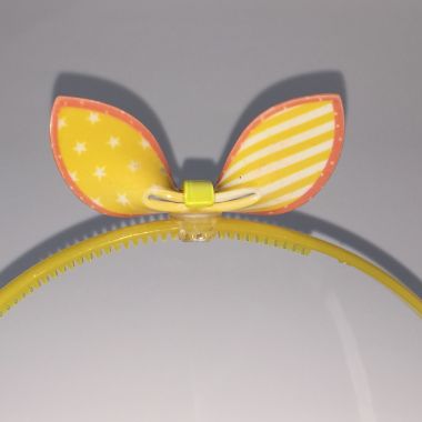 Head band with patterned bow