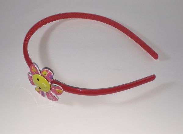Head band with patterned flower shape