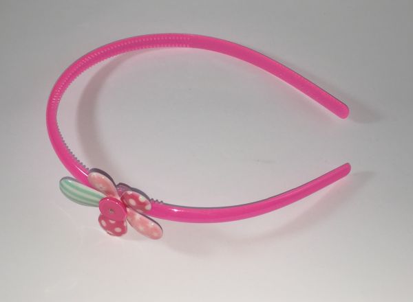 Head band with patterned flower shape