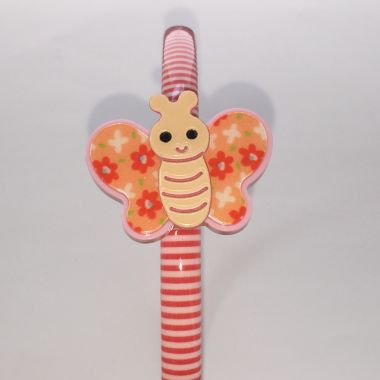Patterned head band with butterfly shape