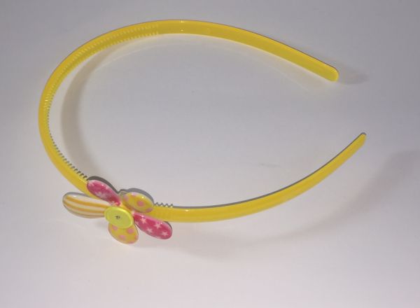 Head band with patterned flower shape