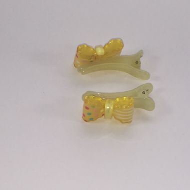 Crocodile clips with bow