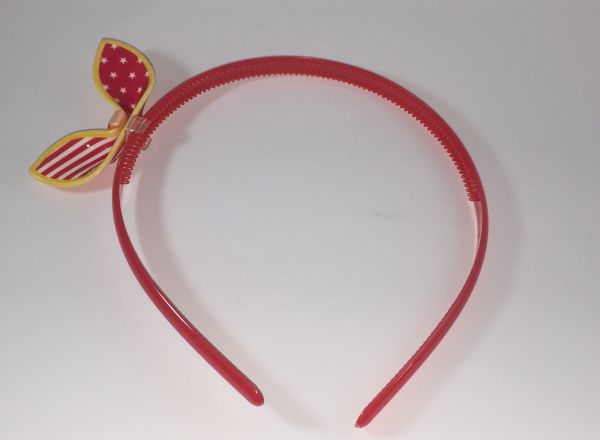 Head band with patterned bow