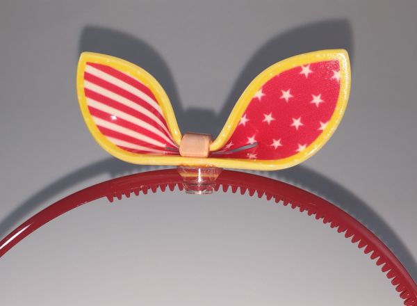 Head band with patterned bow