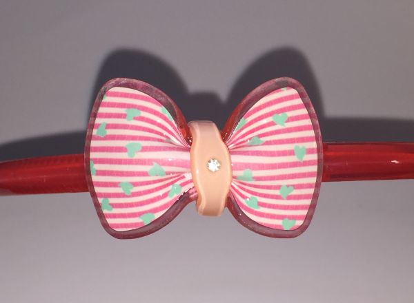 Head band with patterned bow