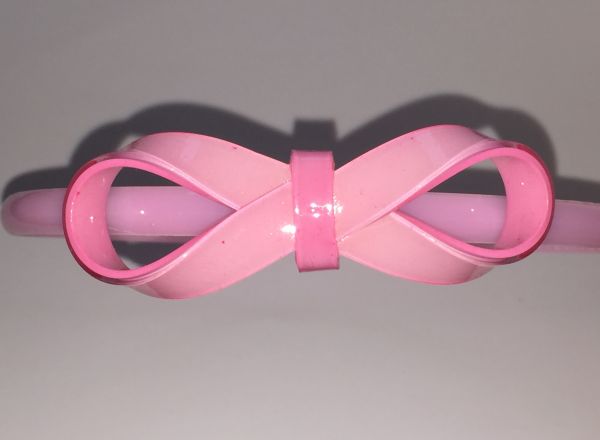 Head band with patterned bow