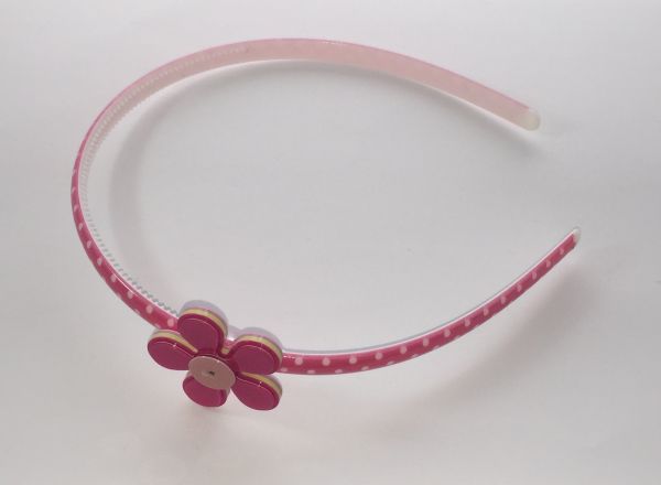 Head band with patterned flower shape