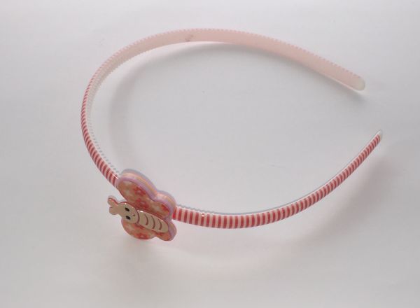 Patterned head band with butterfly shape