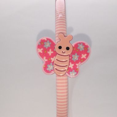 Patterned head band with butterfly shape