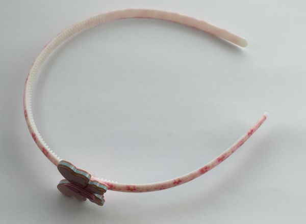 Patterned headband with butterfly shape