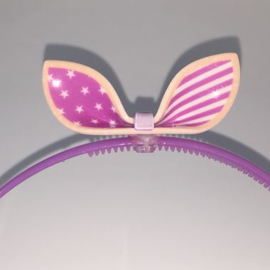 Head band with patterned bow