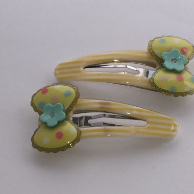 Patterned kids snap clip with bow shape