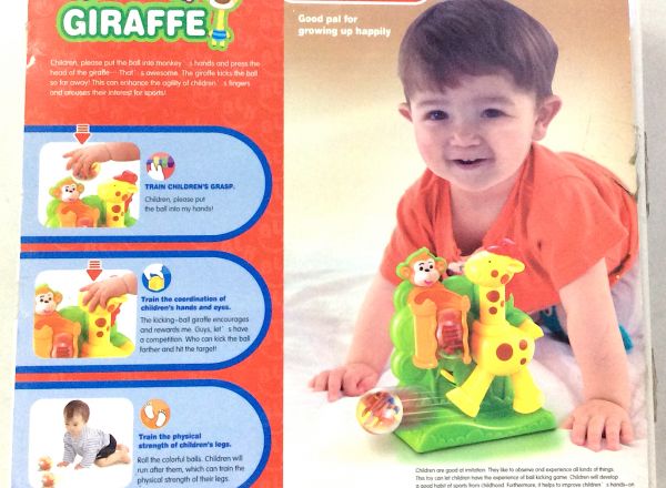 Baby Kicking ball giraffe
