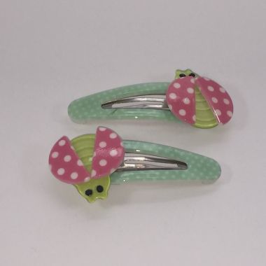 Patterned snap clip with patterned ladybird
