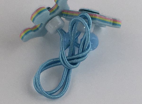 Elastics with crown shape