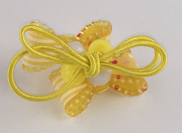 Elastics with patterned bow