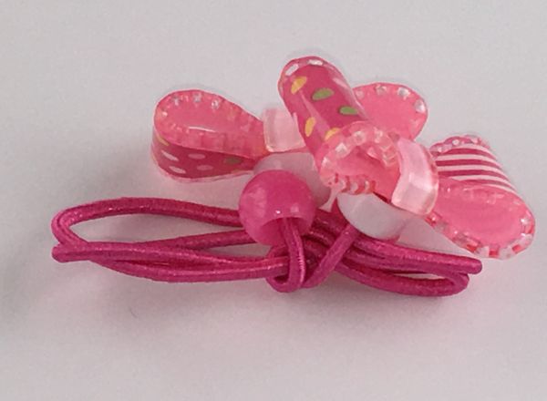 Elastics with patterned bow