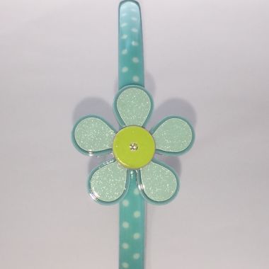 Polka dots patterned headband with flower shape