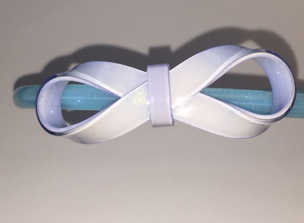 Head band with patterned bow