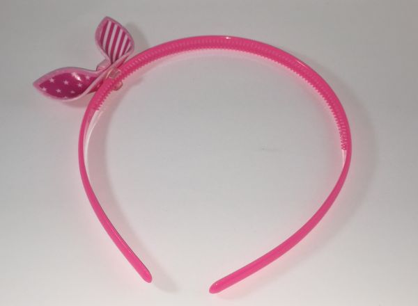 Head band with patterned bow