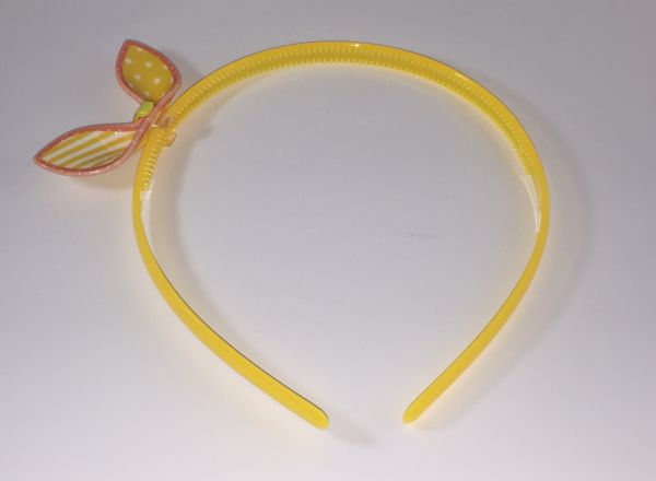 Head band with patterned bow