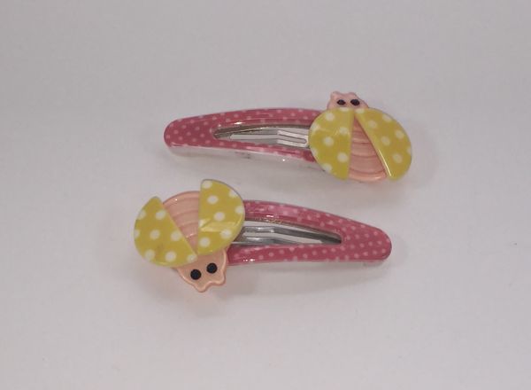 Patterned snap clip with ladybird