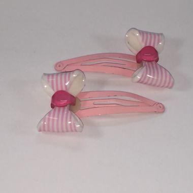 Snap clip with patterned bow