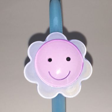 Head band with face patterned flower