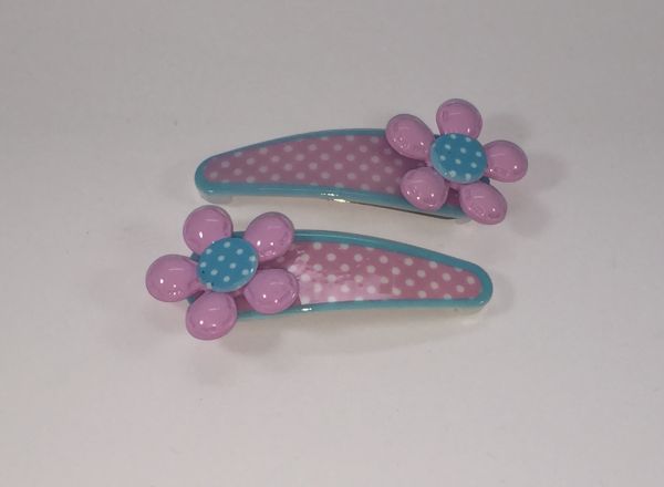 Patterned snap clip with patterned flower