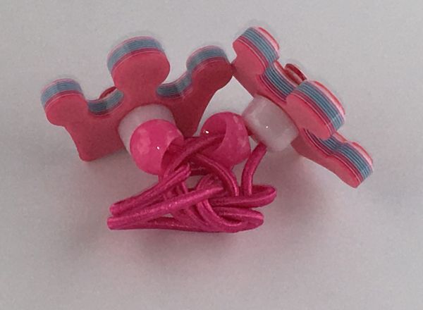 Elastics with crown shape