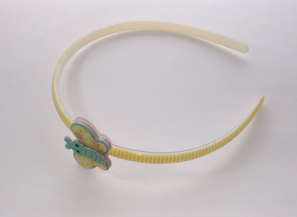 Patterned head band with butterfly shape