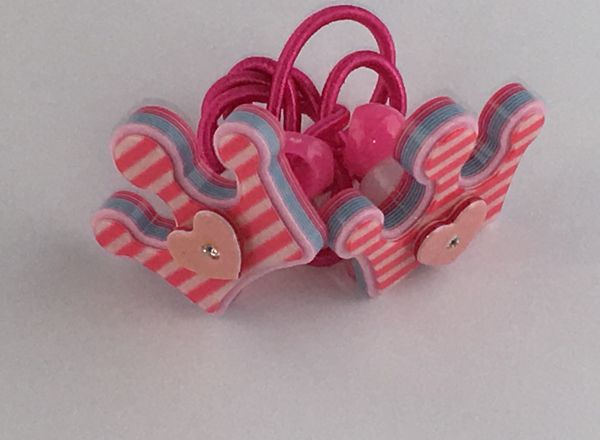 Elastics with crown shape