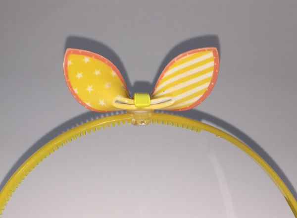 Head band with patterned bow