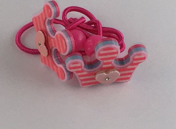Elastics with crown shape