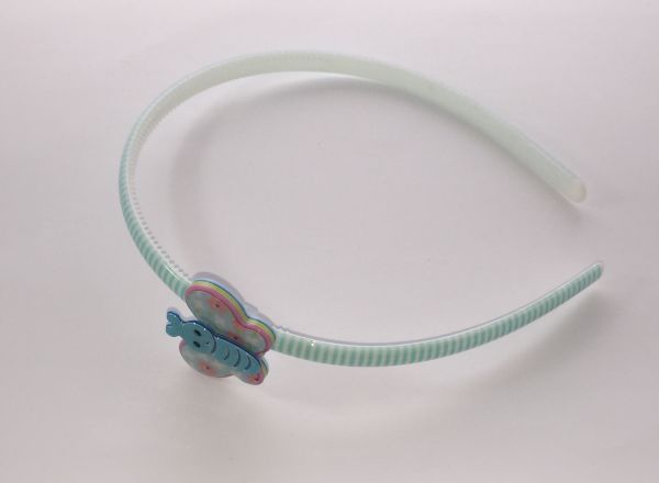 Patterned head band with butterfly shape