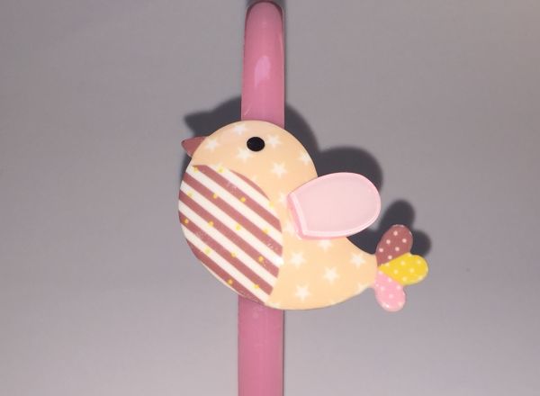 Head band with patterned bird shape