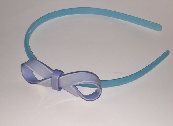 Head band with patterned bow