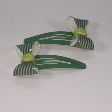 Snap clip with patterned bow