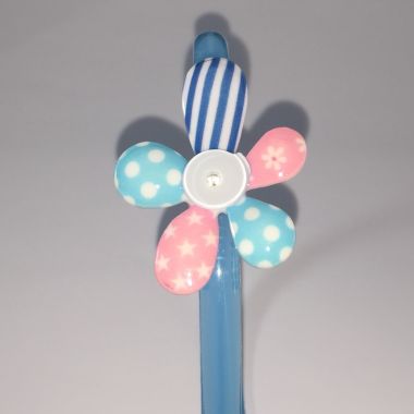 Head band with patterned flower shape