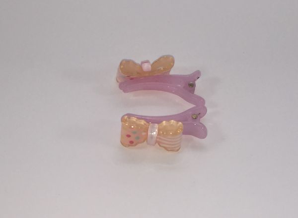 Crocodile clips with bow