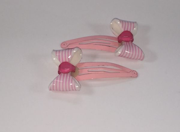 Snap clip with patterned bow